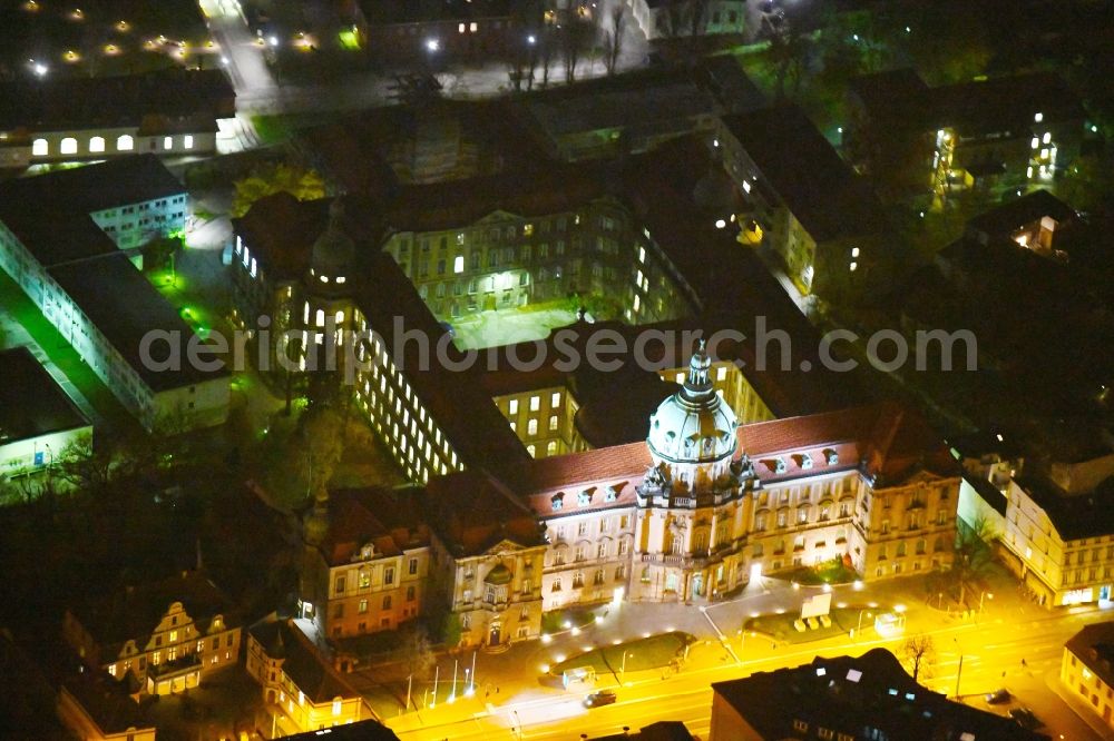 Potsdam at night from the bird perspective: Night lighting Town Hall building of the city administration on Friedrich-Ebert-Strasse in the district Innenstadt in Potsdam in the state Brandenburg, Germany