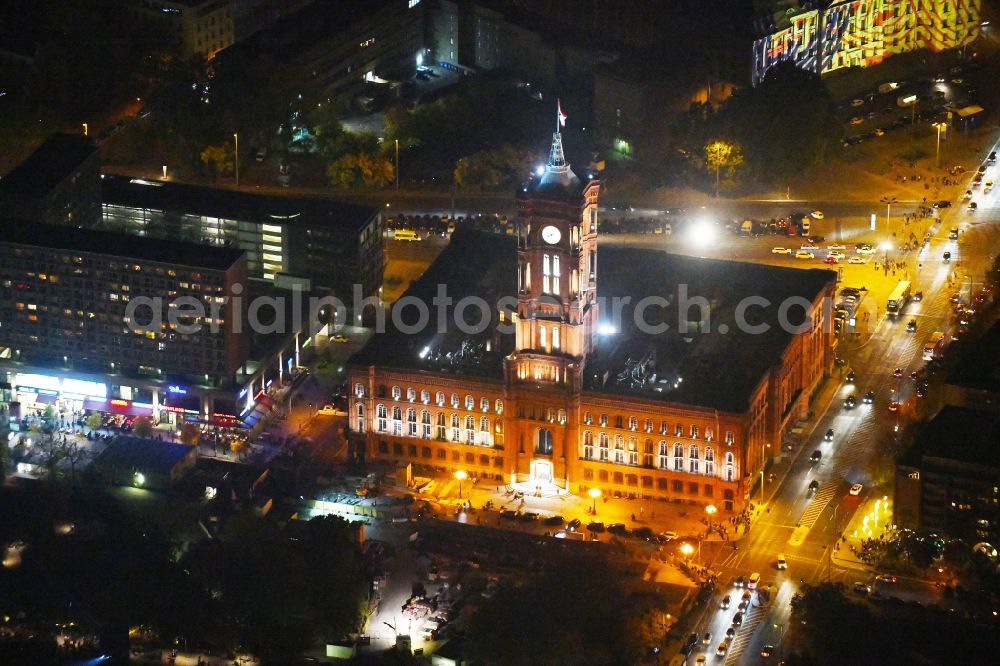 Berlin at night from the bird perspective: Night lighting Town Hall building of the city administration Rotes Rathaus on Rathausstrasse in the district Mitte in Berlin, Germany