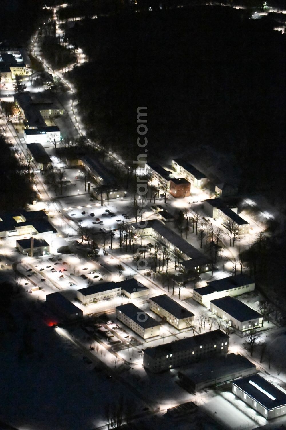 Aerial image at night Schwielowsee - Night view of Building complex of the German army - Bundeswehr military barracks Henning-von-Tresckow-Kaserne am Werderscher Damm in the district Geltow in Schwielowsee in the state Brandenburg