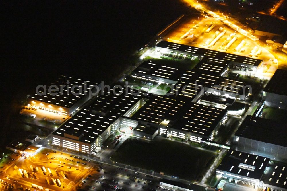 Haldensleben at night from above - Night lighting Building complex and grounds of the logistics center - Otto Versandzentrum on Hamburger Strasse in Haldensleben in the state Saxony-Anhalt, Germany