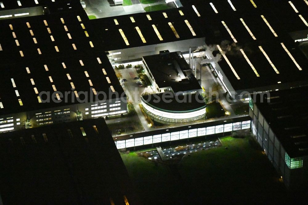 Aerial photograph at night Haldensleben - Night lighting Building complex and grounds of the logistics center - Otto Versandzentrum on Hamburger Strasse in Haldensleben in the state Saxony-Anhalt, Germany