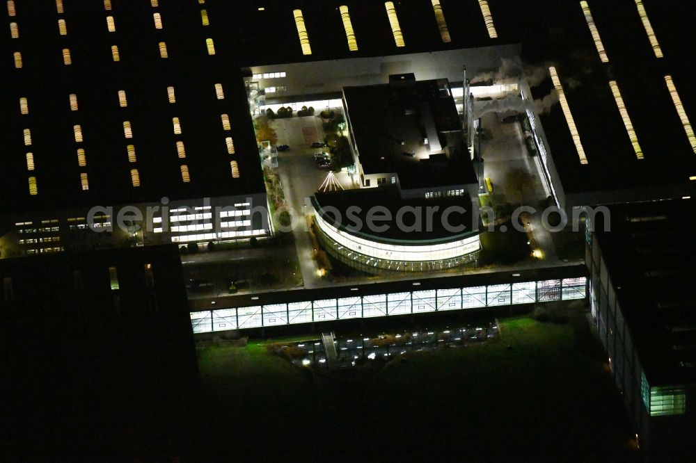 Aerial image at night Haldensleben - Night lighting Building complex and grounds of the logistics center - Otto Versandzentrum on Hamburger Strasse in Haldensleben in the state Saxony-Anhalt, Germany