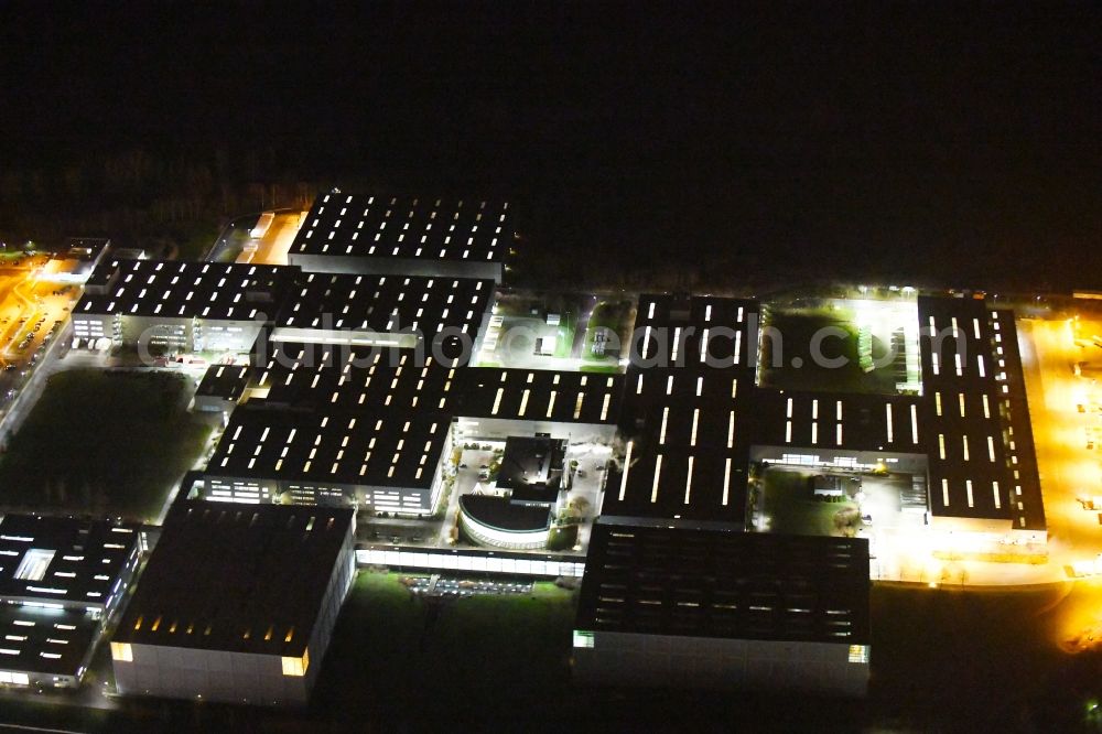 Haldensleben at night from above - Night lighting Building complex and grounds of the logistics center - Otto Versandzentrum on Hamburger Strasse in Haldensleben in the state Saxony-Anhalt, Germany