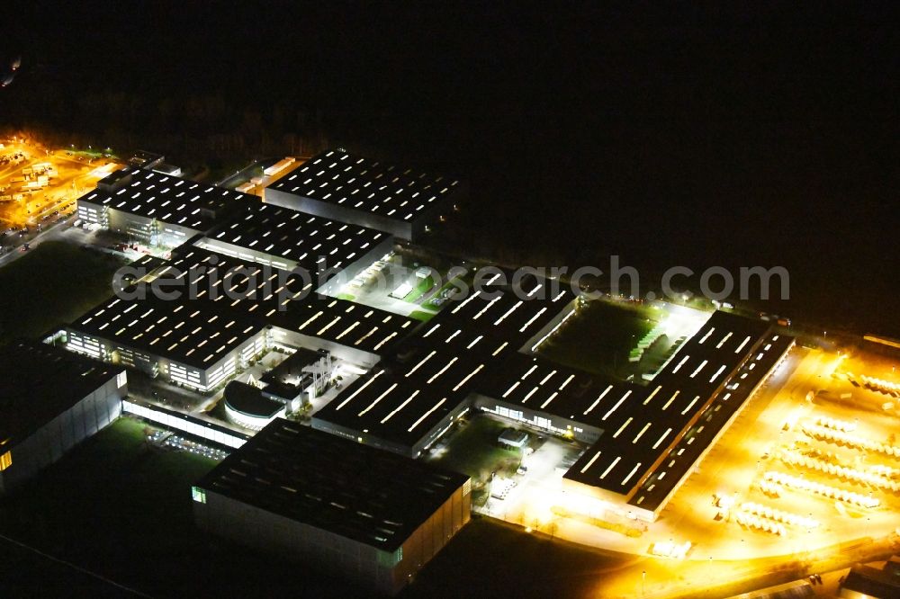 Aerial photograph at night Haldensleben - Night lighting Building complex and grounds of the logistics center - Otto Versandzentrum on Hamburger Strasse in Haldensleben in the state Saxony-Anhalt, Germany