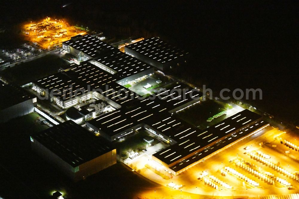 Aerial image at night Haldensleben - Night lighting Building complex and grounds of the logistics center - Otto Versandzentrum on Hamburger Strasse in Haldensleben in the state Saxony-Anhalt, Germany