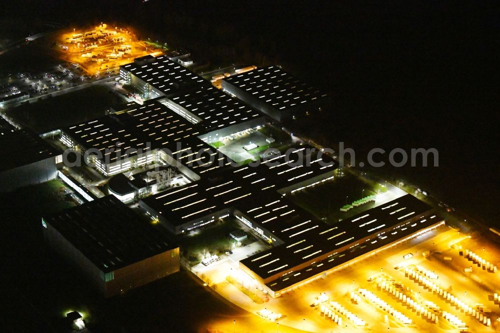 Haldensleben at night from above - Night lighting Building complex and grounds of the logistics center - Otto Versandzentrum on Hamburger Strasse in Haldensleben in the state Saxony-Anhalt, Germany