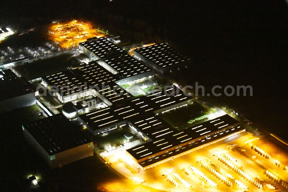 Aerial photograph at night Haldensleben - Night lighting Building complex and grounds of the logistics center - Otto Versandzentrum on Hamburger Strasse in Haldensleben in the state Saxony-Anhalt, Germany