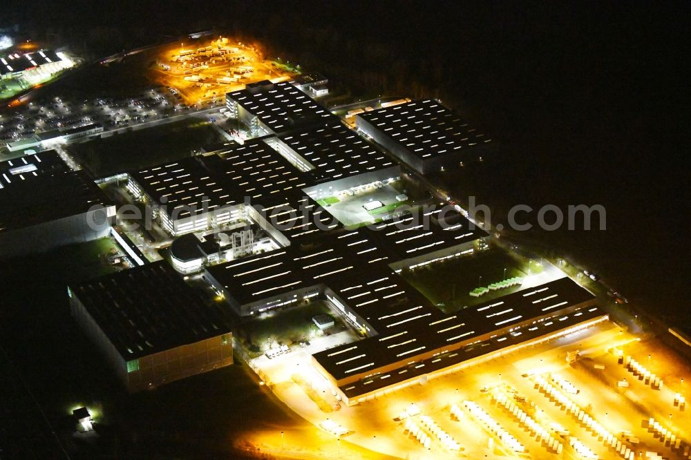 Aerial image at night Haldensleben - Night lighting Building complex and grounds of the logistics center - Otto Versandzentrum on Hamburger Strasse in Haldensleben in the state Saxony-Anhalt, Germany