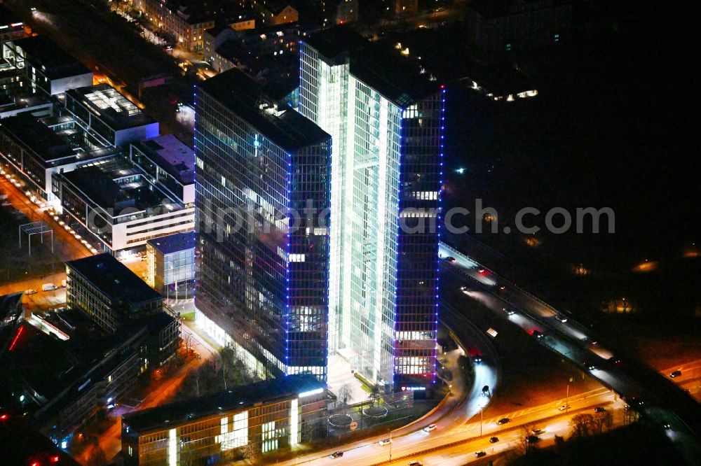 Aerial image at night München - Night lighting high-rise building complex HighLight Towers on corner Mies-van-der-Rohe- und Walter-Gropius-Strasse in the district Schwabing-Freimann in Munich in the state Bavaria, Germany