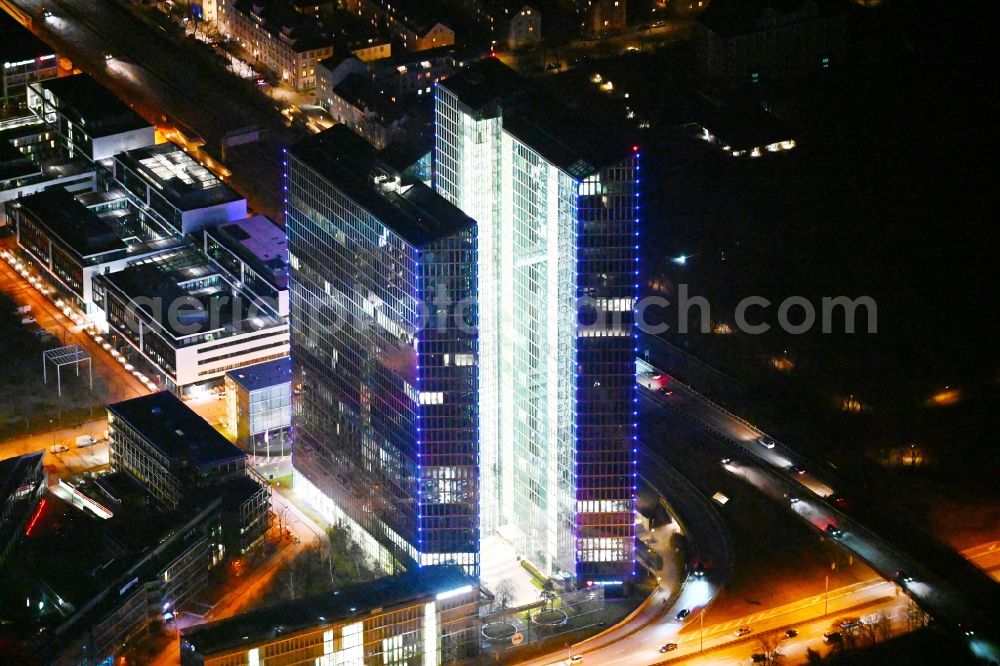 München at night from above - Night lighting high-rise building complex HighLight Towers on corner Mies-van-der-Rohe- und Walter-Gropius-Strasse in the district Schwabing-Freimann in Munich in the state Bavaria, Germany