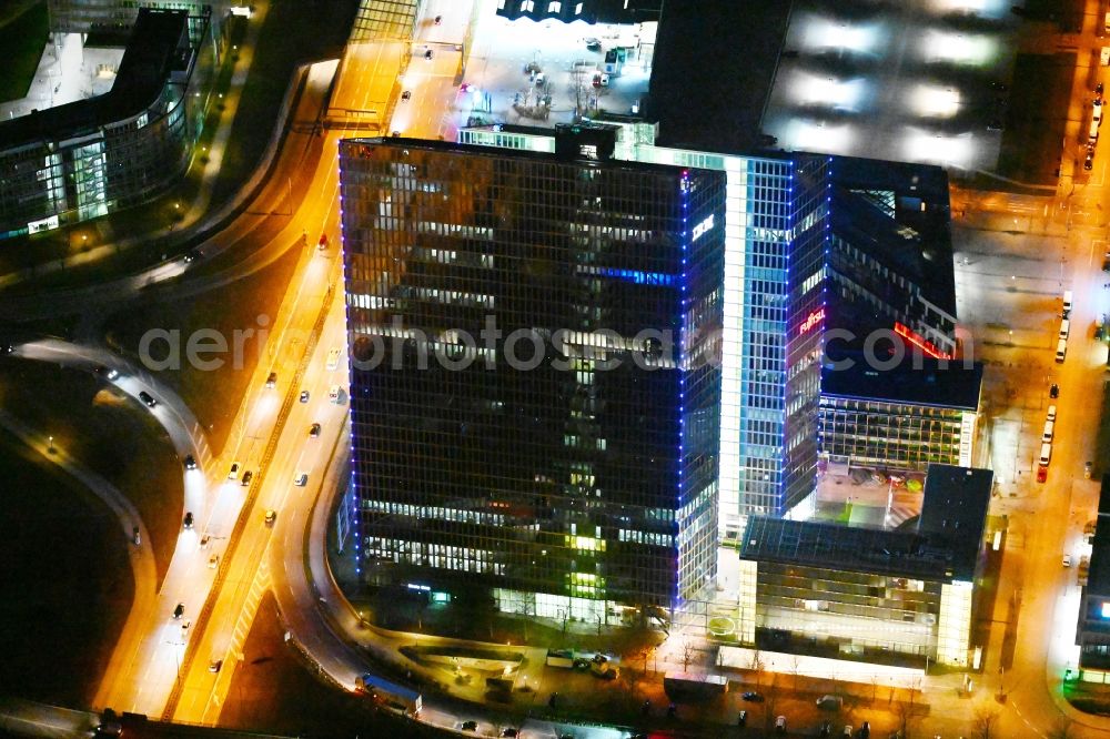 München at night from the bird perspective: Night lighting high-rise building complex HighLight Towers on corner Mies-van-der-Rohe- und Walter-Gropius-Strasse in the district Schwabing-Freimann in Munich in the state Bavaria, Germany