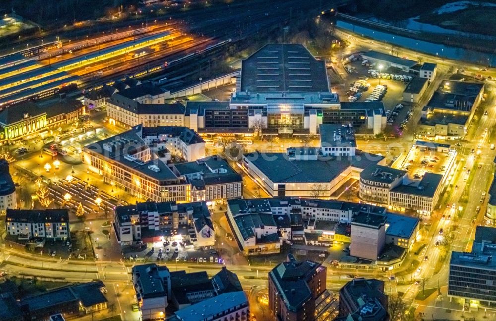 Hamm at night from the bird perspective: Night lighting building complex of the university SRH Hochschule fuer Logistik and Wirtschaft on Platz of Deutschen Einheit in Hamm in the state North Rhine-Westphalia, Germany