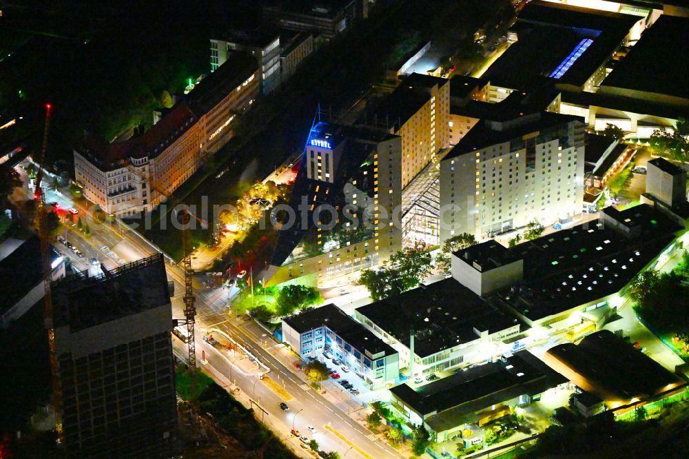 Aerial photograph at night Berlin - Night lighting complex of the hotel building Estrel Berlin in the district Neukoelln in Berlin, Germany