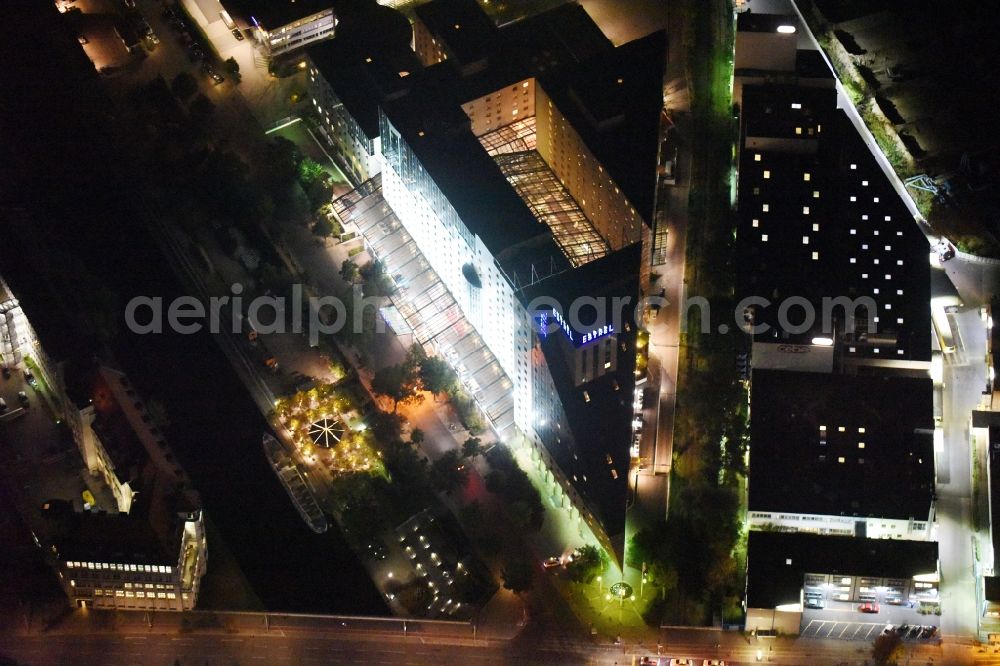 Aerial image at night Berlin - Night view complex of the hotel building Estrel on Sonnenallee destrict im Neukoelln in Berlin in Germany