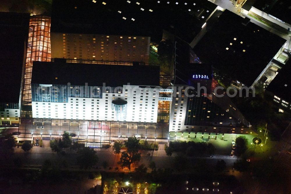 Aerial image at night Berlin - Night view complex of the hotel building Estrel on Sonnenallee destrict im Neukoelln in Berlin in Germany