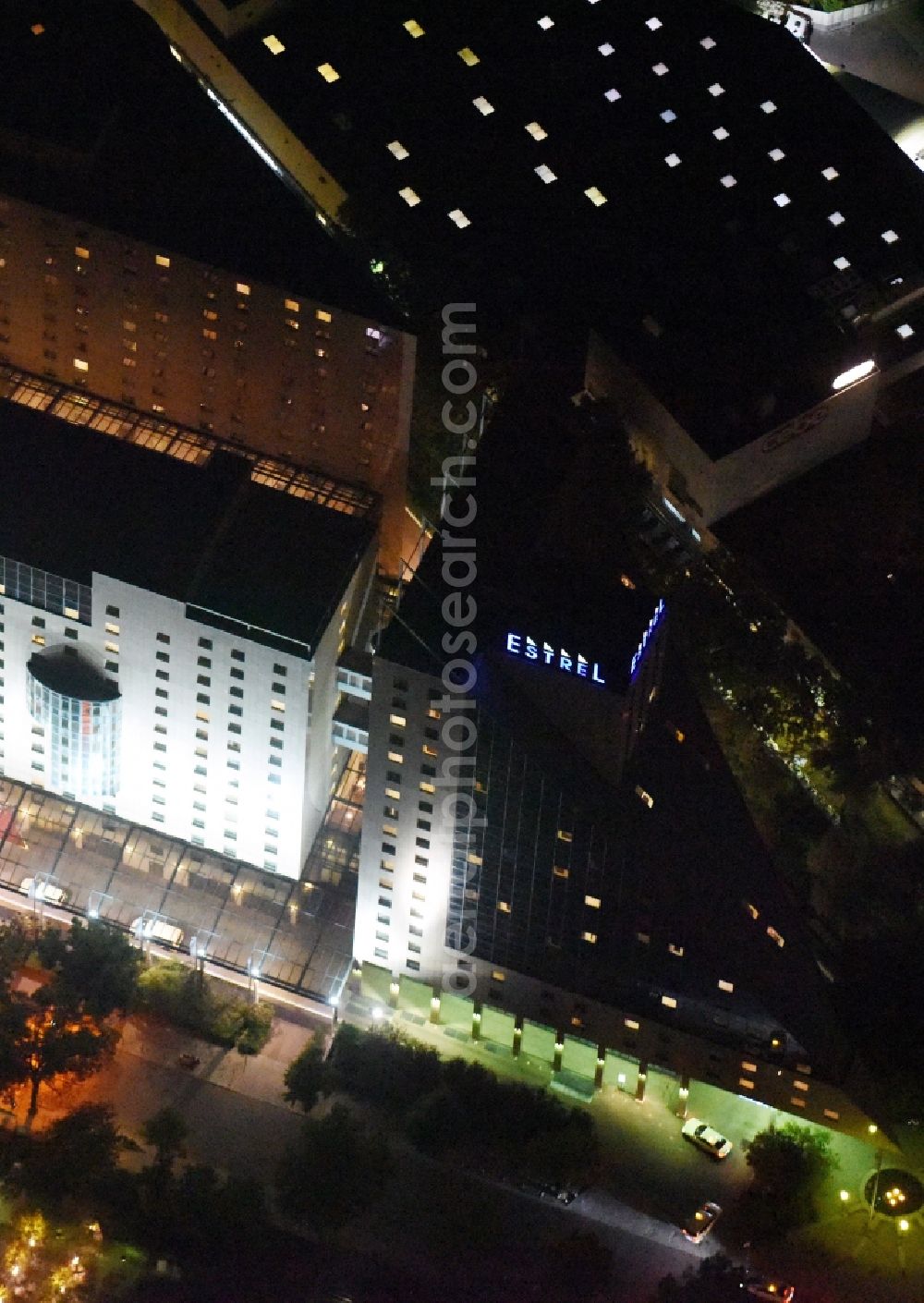 Aerial photograph at night Berlin - Night view complex of the hotel building Estrel on Sonnenallee destrict im Neukoelln in Berlin in Germany