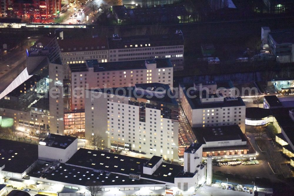 Aerial image at night Berlin - Night view complex of the hotel building Estrel on Sonnenallee destrict im Neukoelln in Berlin in Germany