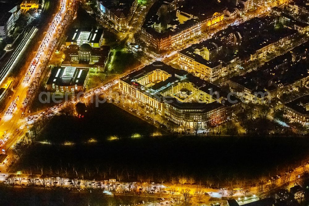 Hamburg at night from the bird perspective: Night lighting complex of the hotel building of Grand-Elysee Hamburg along the Rothenbaumchaussee overlooking the office building standing next to it with various company settlements on Tesdorpfstrasse in the district Rotherbaum in Hamburg, Germany