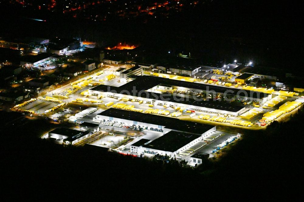 Nürnberg at night from above - Night lighting building complex and distribution center on the site der DHL im Gewerbepark Nuernberg-Feucht in Nuremberg in the state Bavaria