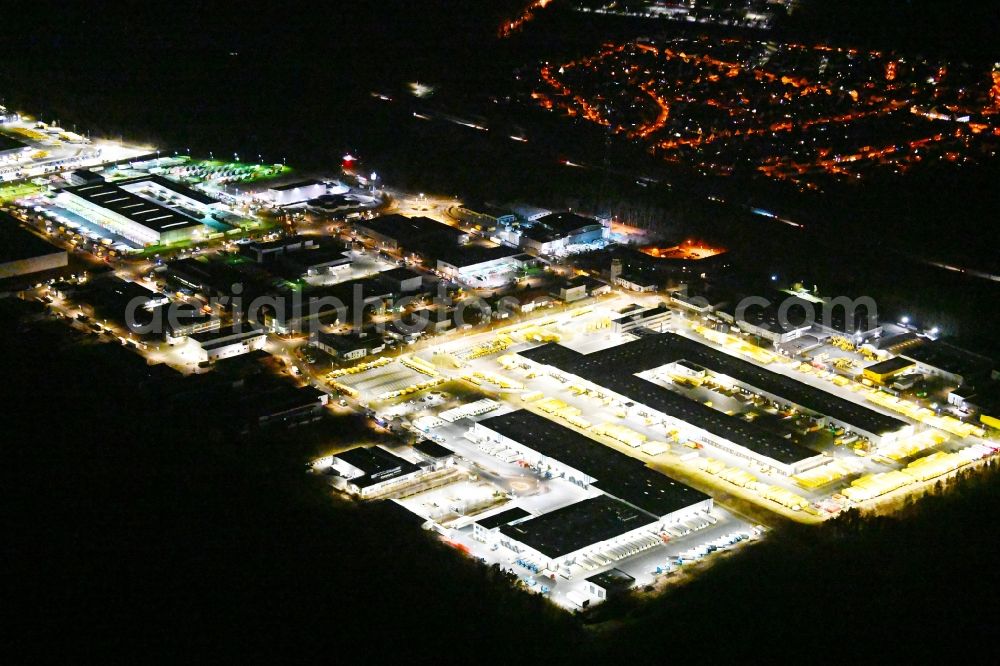 Aerial photograph at night Nürnberg - Night lighting building complex and distribution center on the site der DHL im Gewerbepark Nuernberg-Feucht in Nuremberg in the state Bavaria