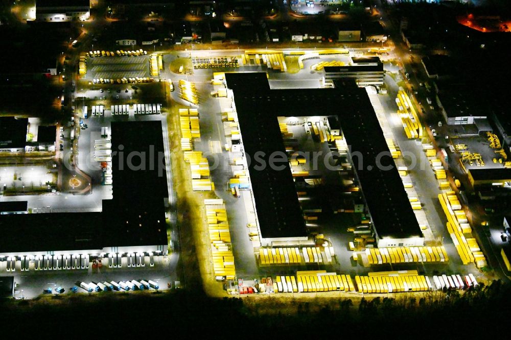 Nürnberg at night from above - Night lighting building complex and distribution center on the site der DHL im Gewerbepark Nuernberg-Feucht in Nuremberg in the state Bavaria