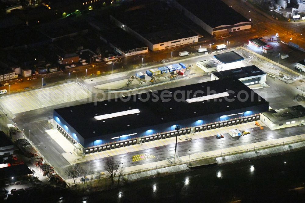 Billbrook at night from above - Night lighting building complex and distribution center on the site of Hermes Logistik-Center - ECE on Billbrookdeich in Billbrook in the state Hamburg, Germany