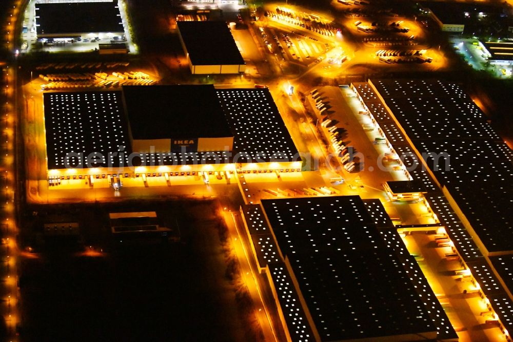 Aerial photograph at night Erfurt - Night lighting Building complex and distribution center on the site of IKEA Zentrallagers In of Langen Else in the district Buessleben in Erfurt in the state Thuringia, Germany