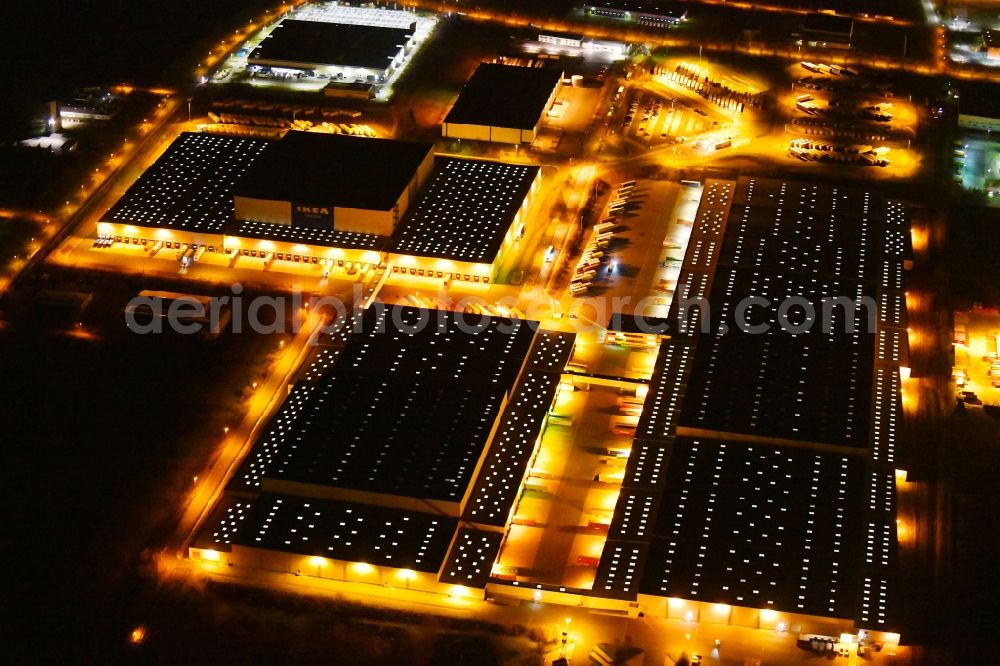 Erfurt at night from above - Night lighting Building complex and distribution center on the site of IKEA Zentrallagers In of Langen Else in the district Buessleben in Erfurt in the state Thuringia, Germany