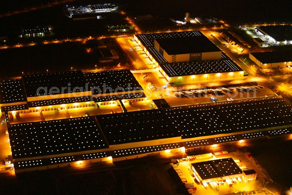 Aerial photograph at night Erfurt - Night lighting Building complex and distribution center on the site of IKEA Zentrallagers In of Langen Else in the district Buessleben in Erfurt in the state Thuringia, Germany