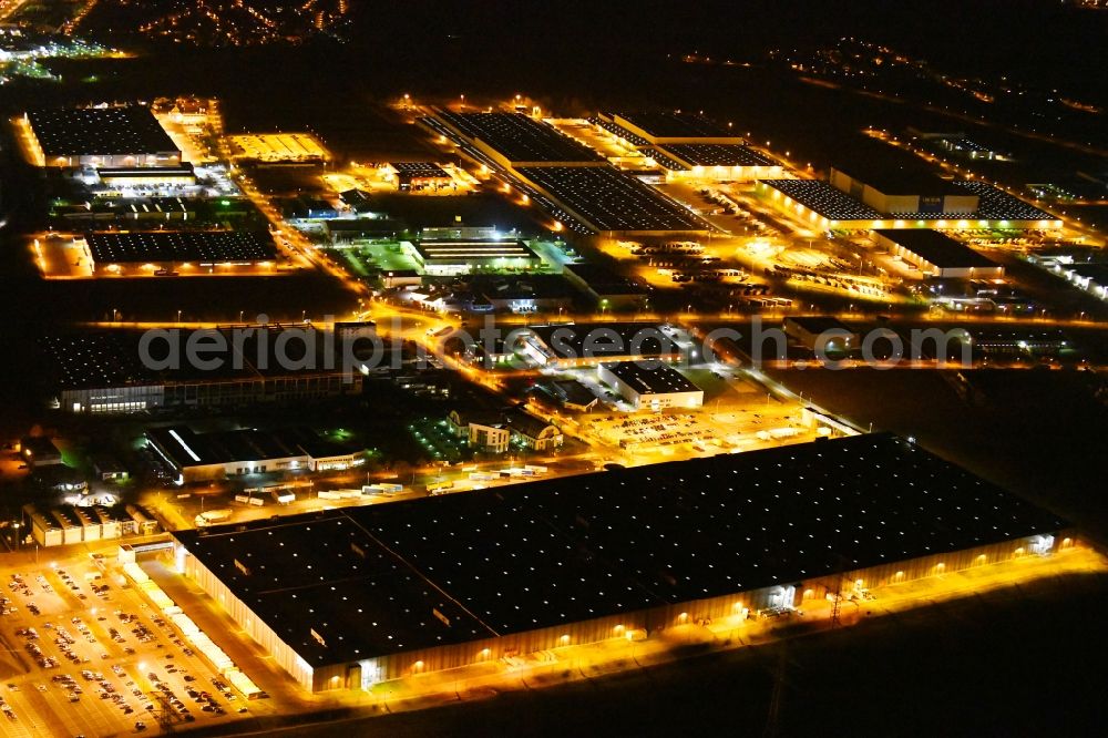 Aerial image at night Erfurt - Night lighting Building complex and distribution center on the site of Zalando Logistics SE & Co. KG In of Hochstedter corner in the district Hochstedt in Erfurt in the state Thuringia, Germany