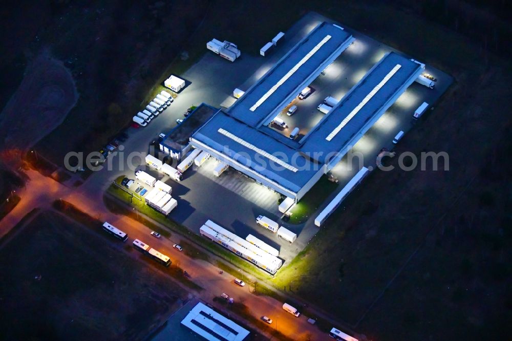 Aerial photograph at night Bernau - Night lighting building complex and distribution center on the site GLS on Ringstrasse in the district Schoenow in Bernau in the state Brandenburg, Germany