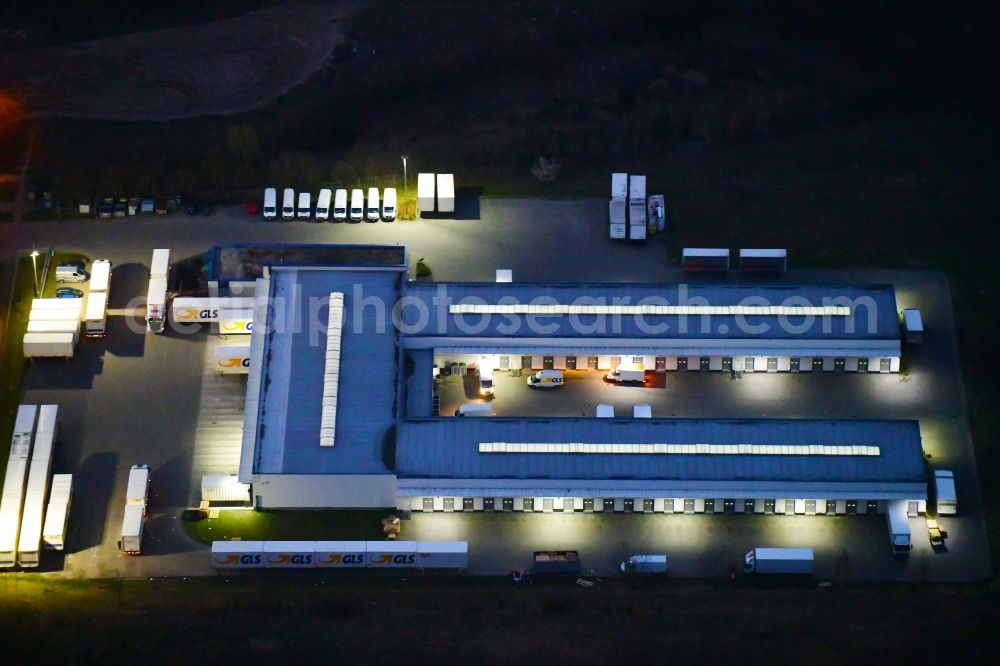 Bernau at night from above - Night lighting building complex and distribution center on the site GLS on Ringstrasse in the district Schoenow in Bernau in the state Brandenburg, Germany