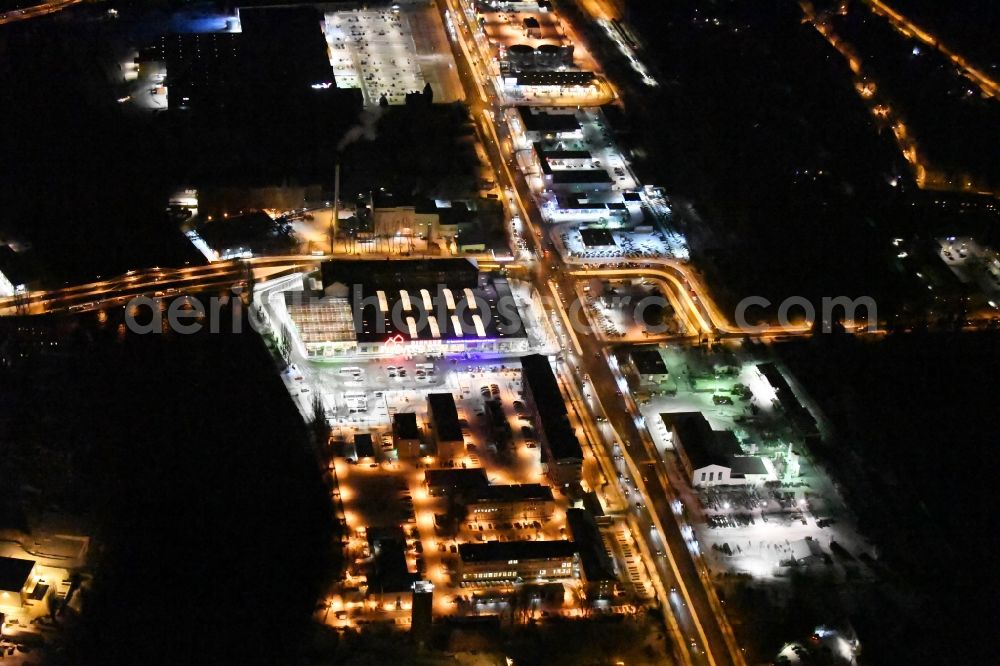 Berlin at night from above - Nigt view Building complex of the police Bundespolizeidirektion in the district Niederschoeneweide in Berlin