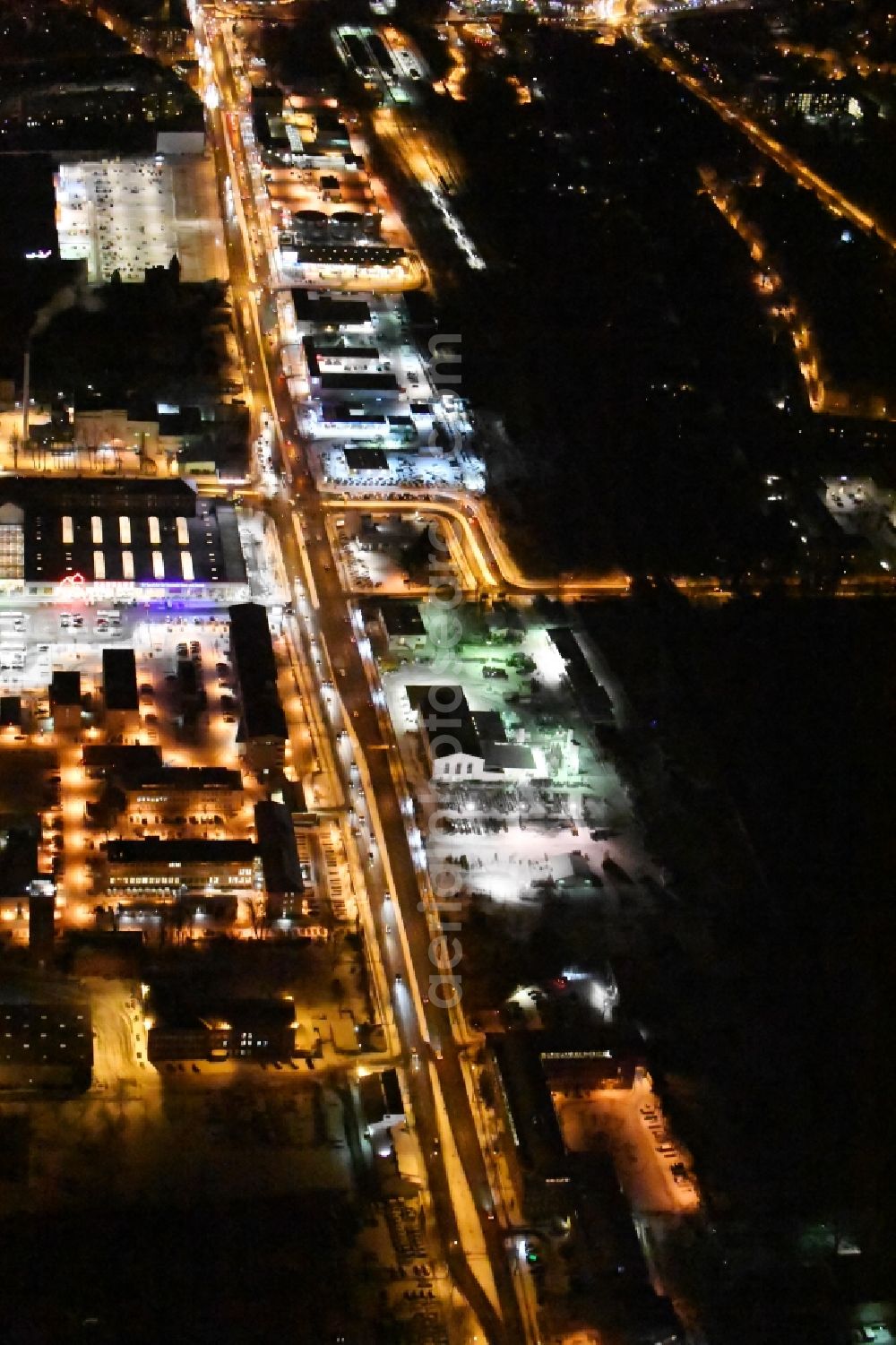 Aerial photograph at night Berlin - Nigt view Building complex of the police Bundespolizeidirektion in the district Niederschoeneweide in Berlin