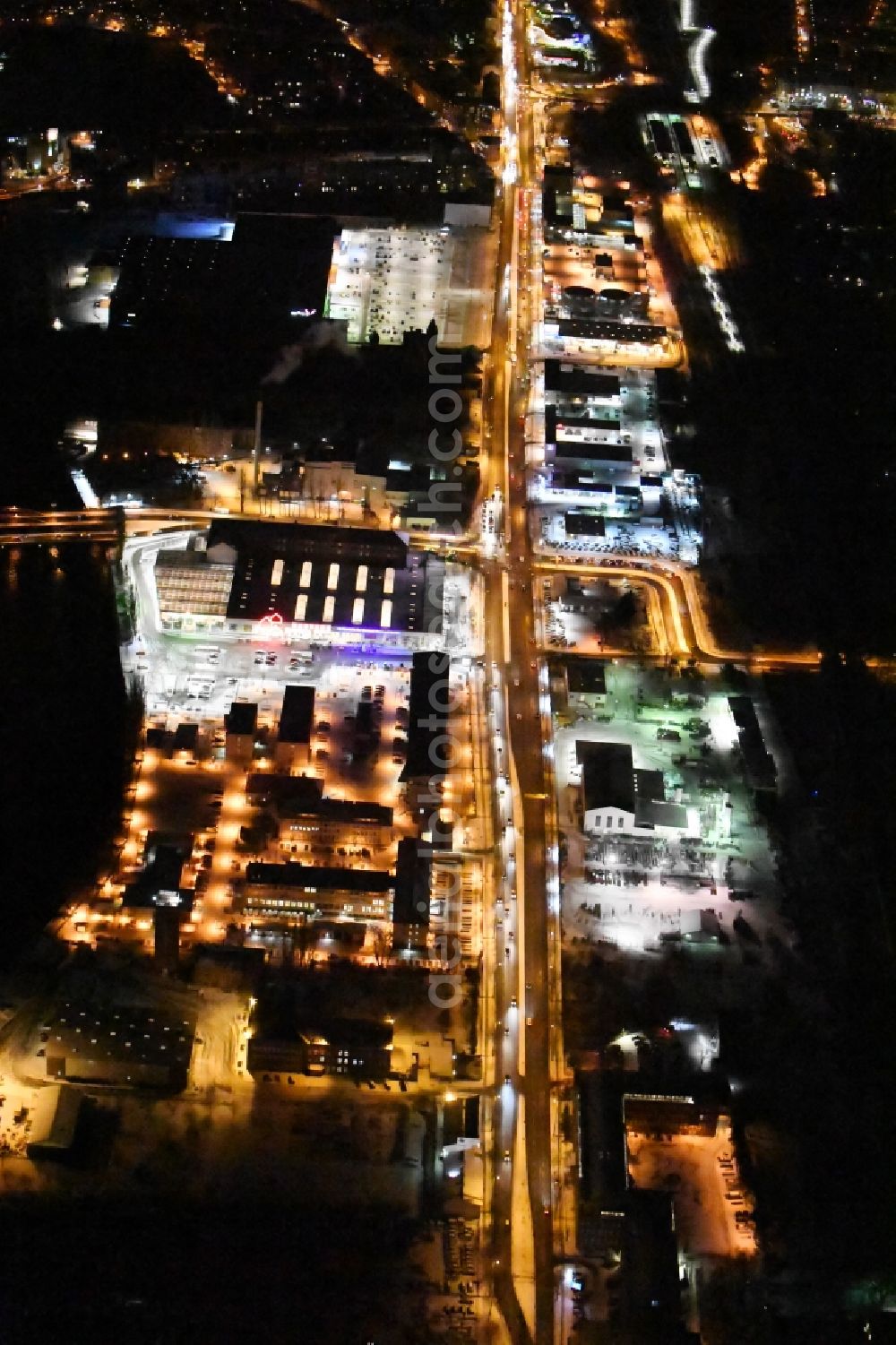 Berlin at night from above - Nigt view Building complex of the police Bundespolizeidirektion in the district Niederschoeneweide in Berlin