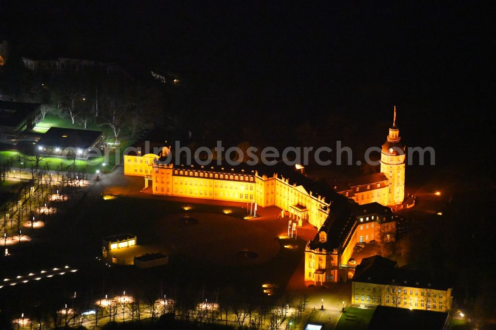 Aerial image at night Karlsruhe - Night lighting building complex in the park of the castle Karlsruhe in Karlsruhe in the state Baden-Wurttemberg, Germany