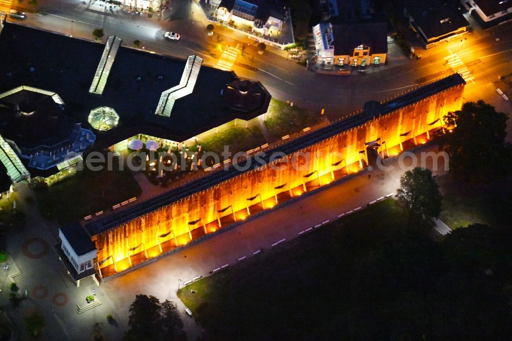 Aerial photograph at night Bad Rothenfelde - Night lighting Industrial monument of the technical plants and salines Altes Gradierwerk in Bad Rothenfelde in the state Lower Saxony, Germany