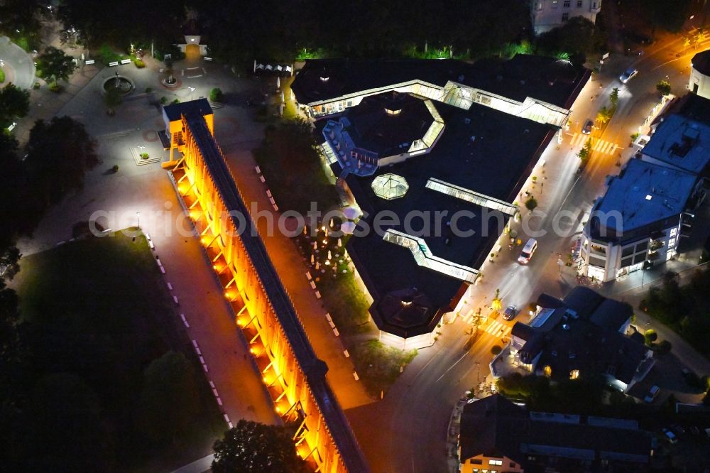 Bad Rothenfelde at night from the bird perspective: Night lighting Industrial monument of the technical plants and salines Altes Gradierwerk in Bad Rothenfelde in the state Lower Saxony, Germany