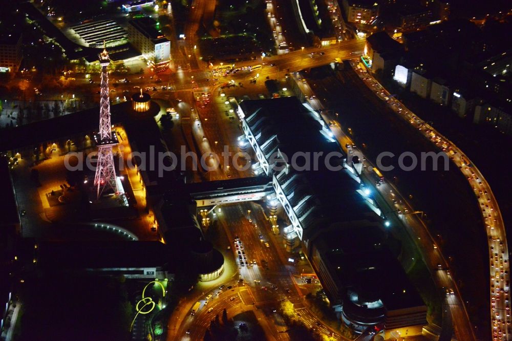 Aerial photograph at night Berlin - Night aerial terrain at the radio tower and fairgrounds ICC congress center in the district of Charlottenburg in Berlin