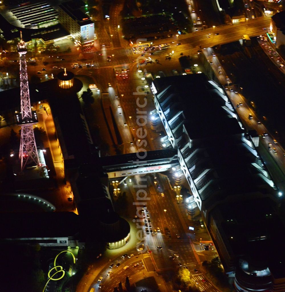 Aerial image at night Berlin - Night aerial terrain at the radio tower and fairgrounds ICC congress center in the district of Charlottenburg in Berlin