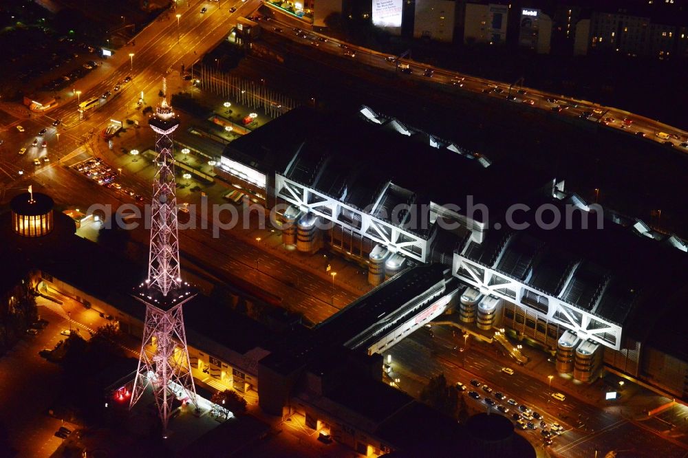 Berlin at night from the bird perspective: Night aerial terrain at the radio tower and fairgrounds ICC congress center in the district of Charlottenburg in Berlin