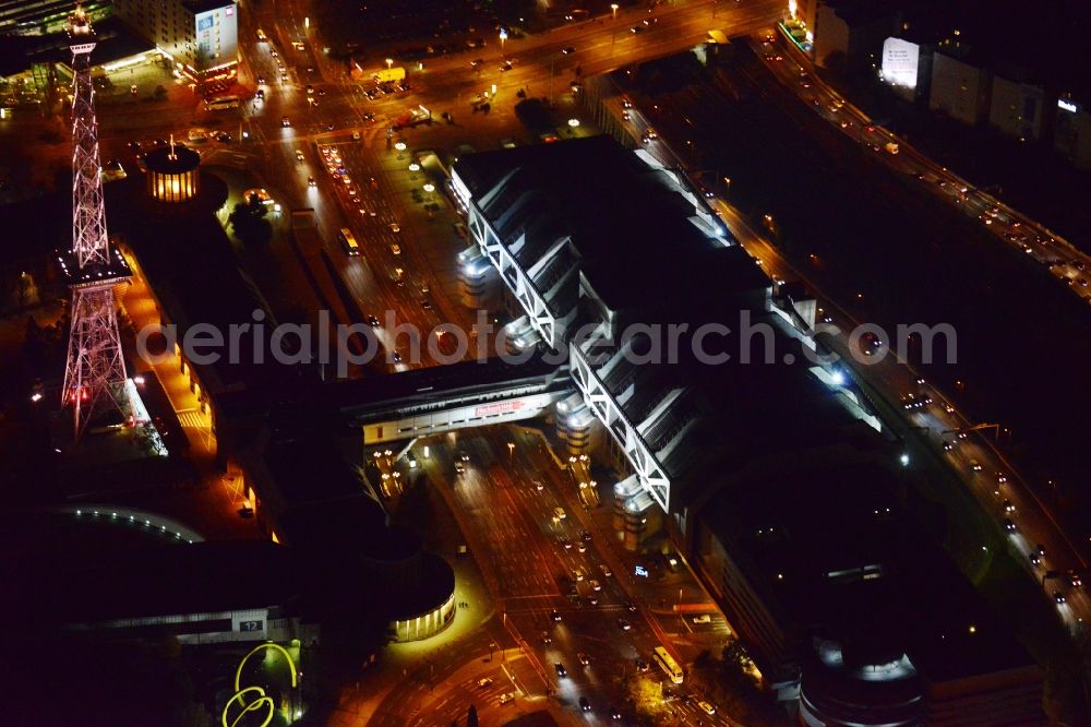 Aerial image at night Berlin - Night aerial terrain at the radio tower and fairgrounds ICC congress center in the district of Charlottenburg in Berlin