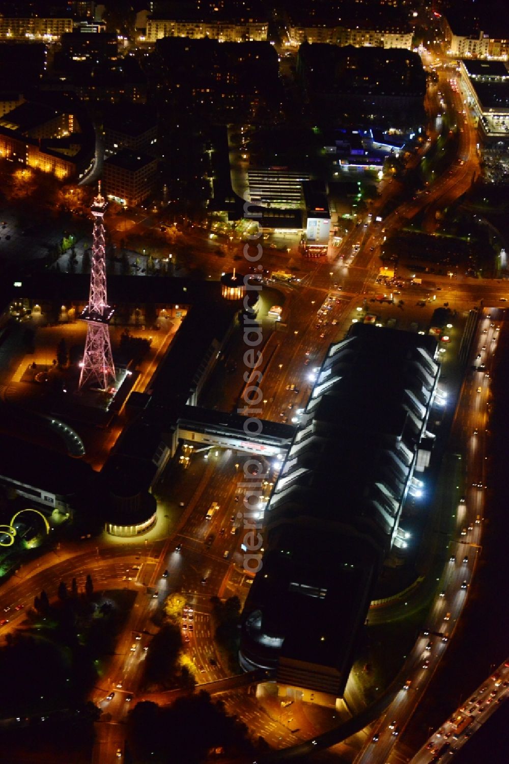 Aerial photograph at night Berlin - Night aerial terrain at the radio tower and fairgrounds ICC congress center in the district of Charlottenburg in Berlin