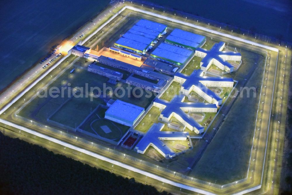 Aerial photograph at night Burg - Night lighting prison grounds and high security fence Prison in Burg in the state Saxony-Anhalt