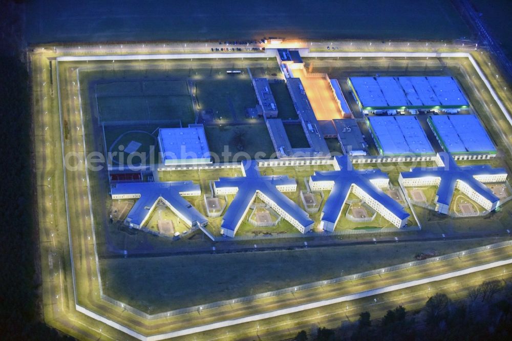 Aerial photograph at night Burg - Night lighting prison grounds and high security fence Prison in Burg in the state Saxony-Anhalt