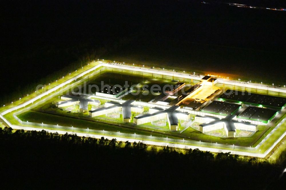 Burg at night from the bird perspective: Night lighting prison grounds and high security fence Prison in Burg in the state Saxony-Anhalt