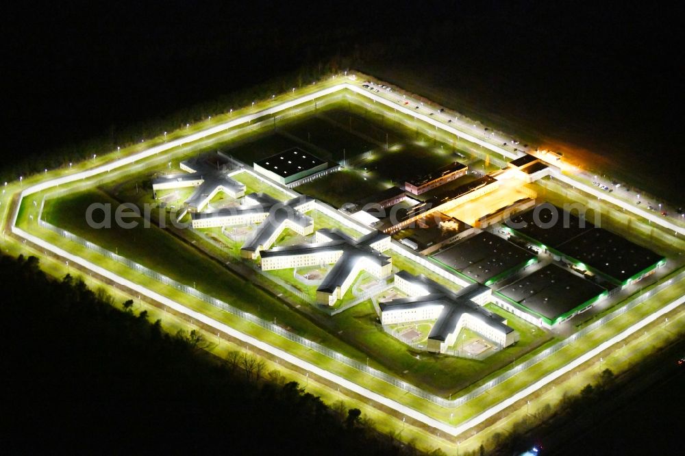 Burg at night from the bird perspective: Night lighting prison grounds and high security fence Prison in Burg in the state Saxony-Anhalt