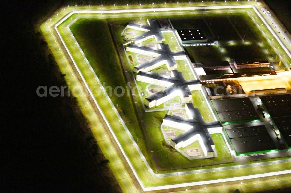 Aerial photograph at night Burg - Night lighting prison grounds and high security fence Prison in Burg in the state Saxony-Anhalt