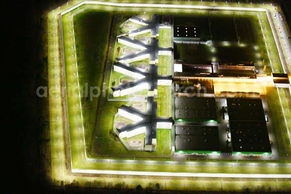 Aerial photograph at night Burg - Night lighting prison grounds and high security fence Prison in Burg in the state Saxony-Anhalt