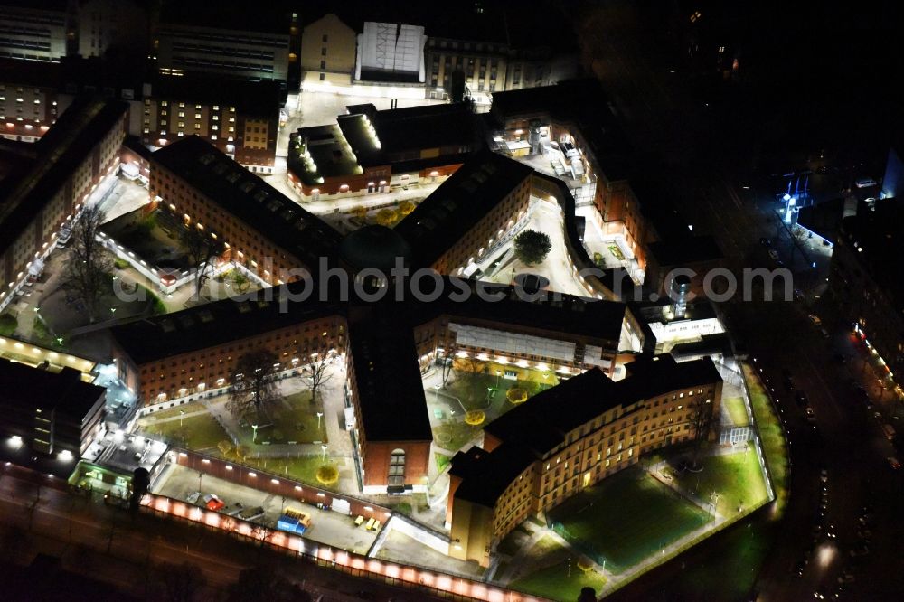 Berlin at night from above - Night view of prison grounds and high security fence Prison Moabit in Alt-Moabit in Berlin